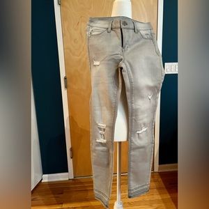 Grey Skinny Jeans with patched rips; White House Black Market - Size 0